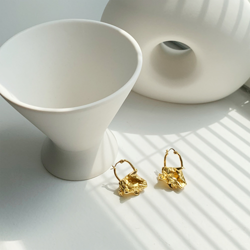 Gold art earring
