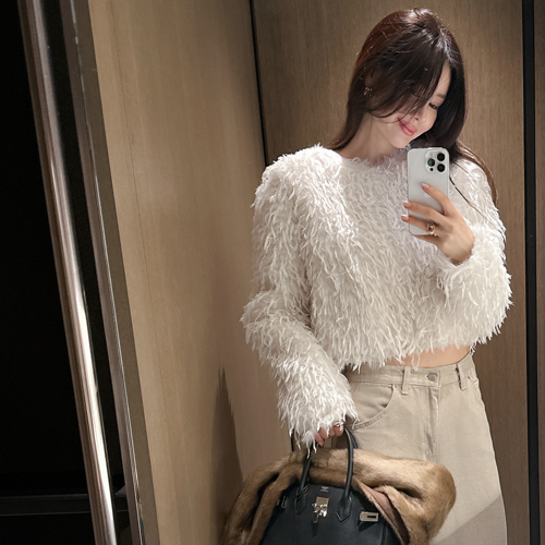 Ridge feather crop blouse