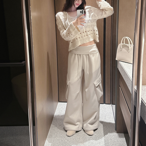 Cove banding over cargo pants